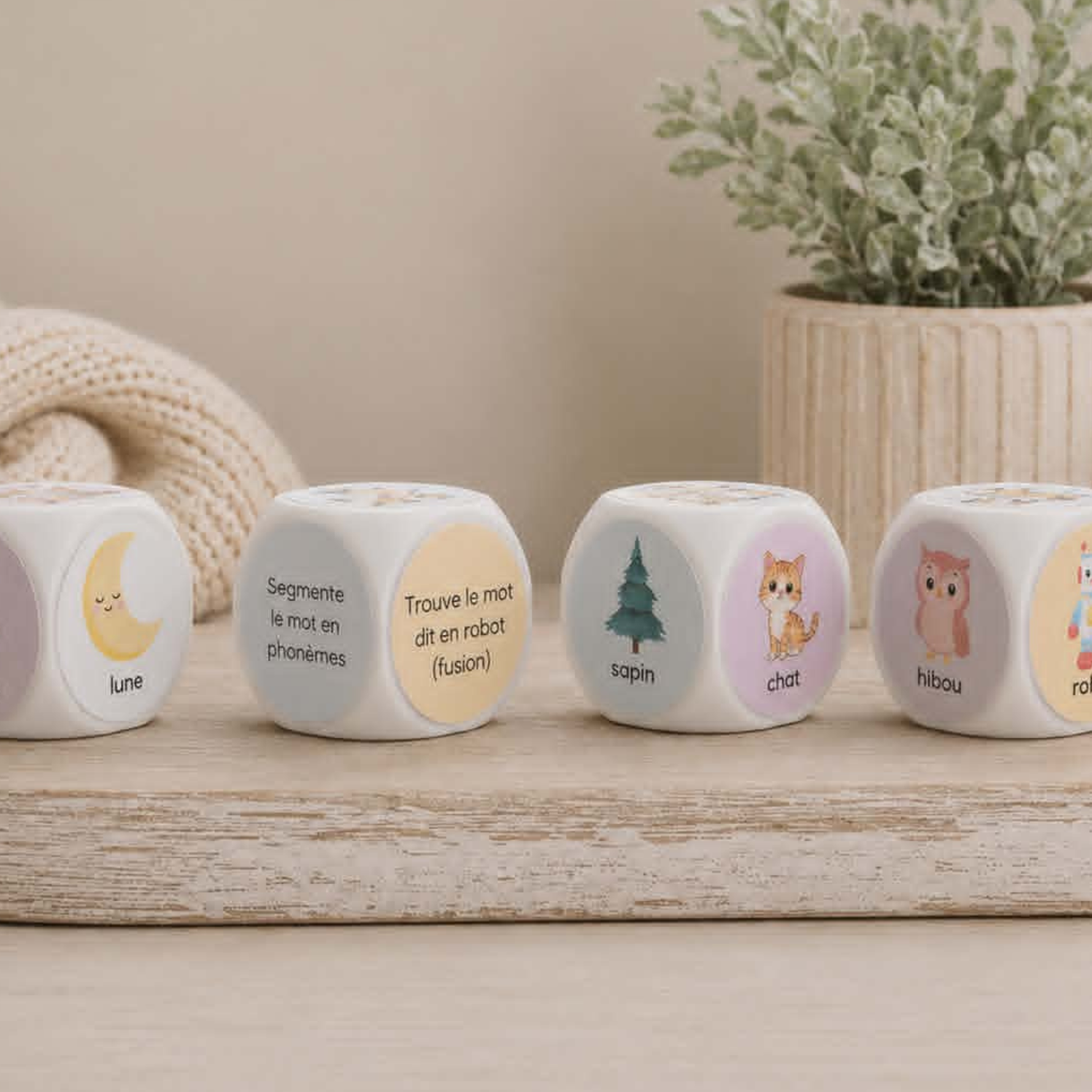 Ensemble de dés éducatifs de conscience phonologique pour enfants avec images et activités sur les sons, phonèmes, fusion et segmentation.